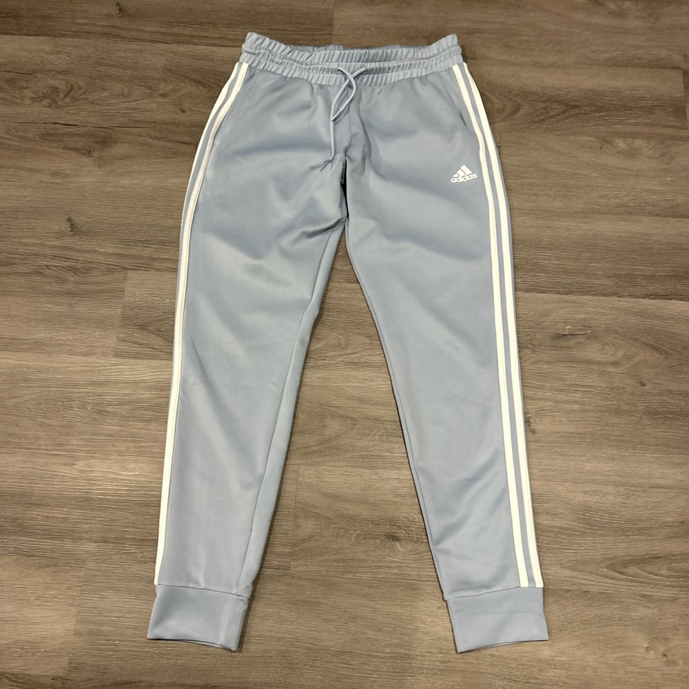 Adidas Women's Light Blue Joggers with White Stripes